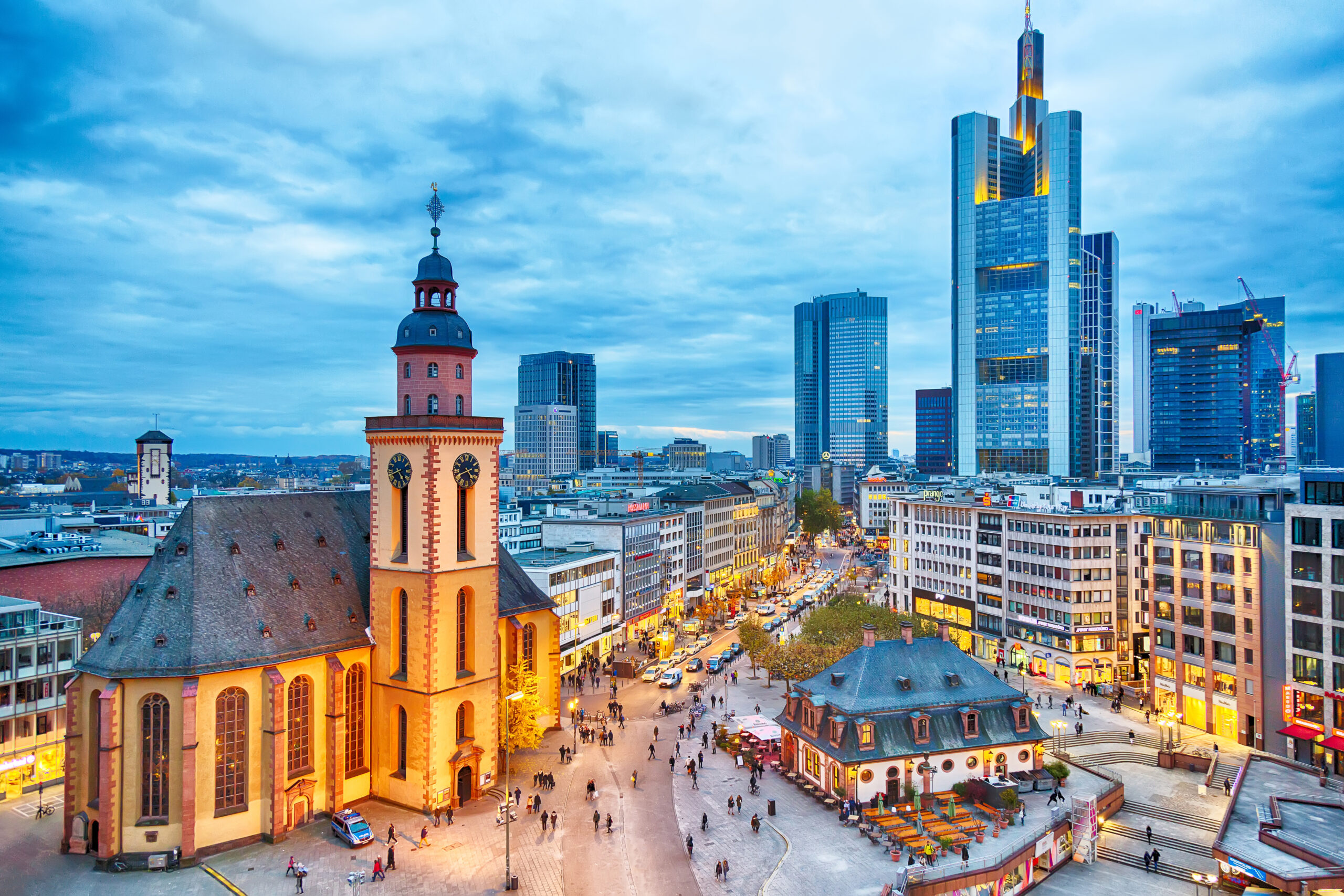 FRANKFURT, GERMANY NOVEMBER, 2017: View To Skyline Of Frankfurt In Sunset Blue Hour. St Paul's Church And The Hauptwache Main Guard Building At Frankfurt Central Street Zeil.